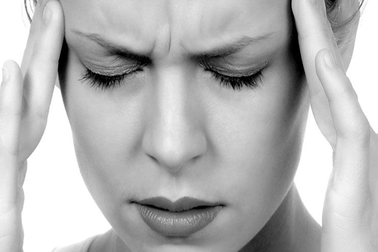 causes of headache behind eyes