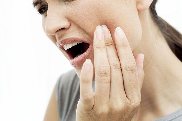 What causes sensitive teeth