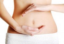 Benefits of Applying Oil on Belly Button applying oil on belly button