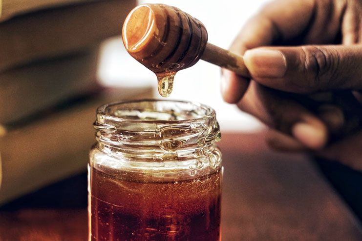 Laryngitis - Honey with holy basil leaves