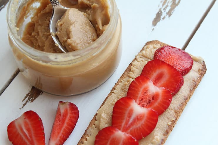 Nut butter and strawberry open sandwich