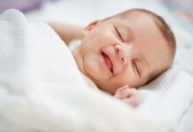 Why Do You Laugh in Your Sleep? Causes, Sleep Science & When to Worry Why Do You Laugh in Your Sleep